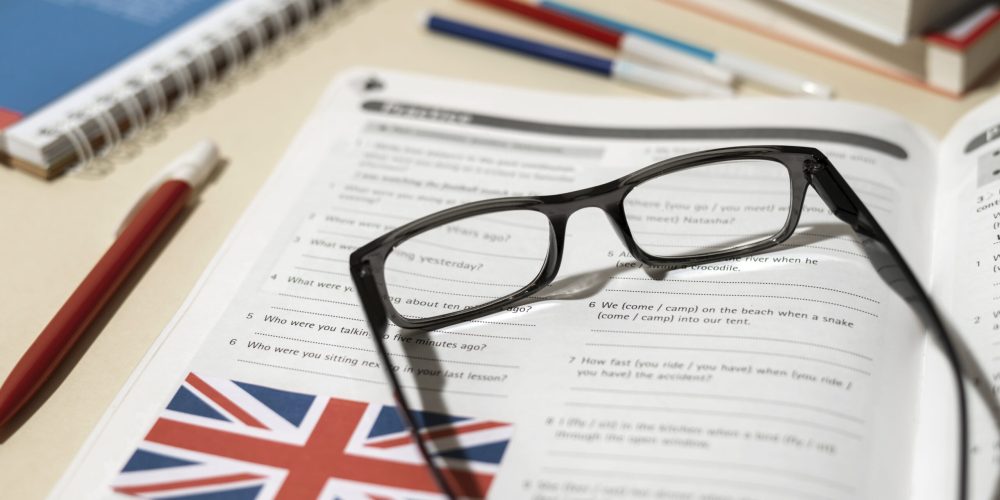 english-book-with-glasses-table